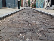 https://upload.wikimedia.org/wikipedia/commons/thumb/9/9f/Wood_block_pavement_South_Camac_Street.jpg/220px-Wood_block_pavement_South_Camac_Street.jpg